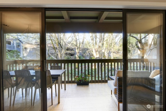 sunroom / solarium featuring a wealth of natural light