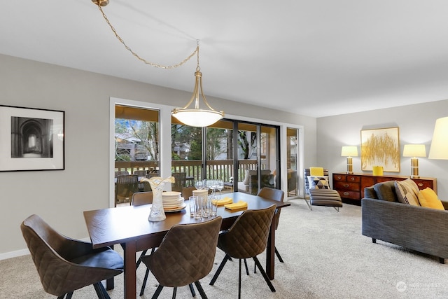 view of carpeted dining room