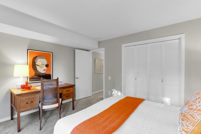 carpeted bedroom featuring a closet