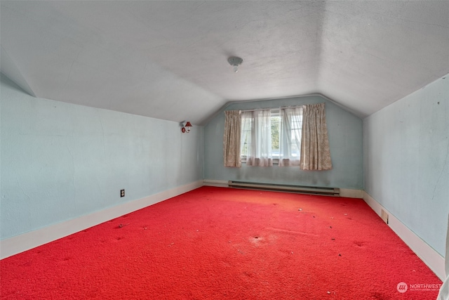 bonus room featuring carpet flooring, a baseboard radiator, and vaulted ceiling