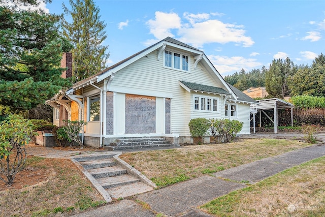 view of front of house featuring a carport