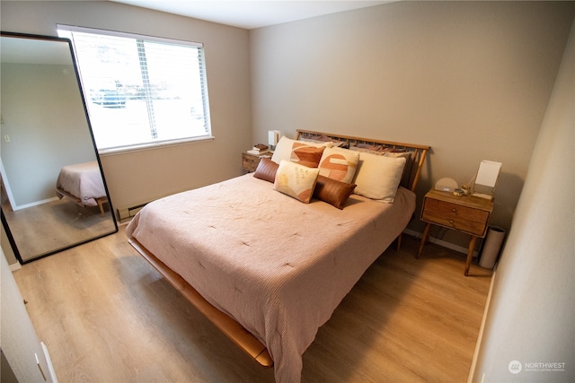 bedroom with light wood-type flooring