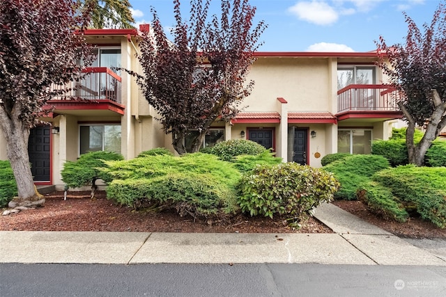 view of property featuring a balcony