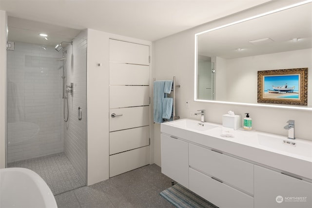 bathroom featuring an enclosed shower and vanity