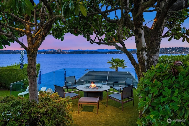 view of water feature featuring a fire pit