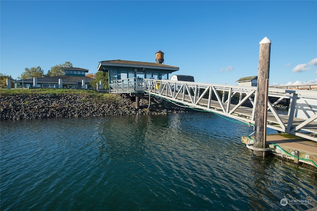 dock area featuring a water view