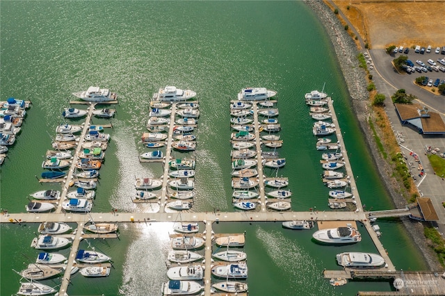 birds eye view of property featuring a water view