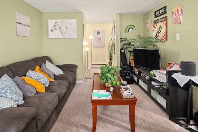 living room featuring light colored carpet, baseboard heating, and a textured ceiling