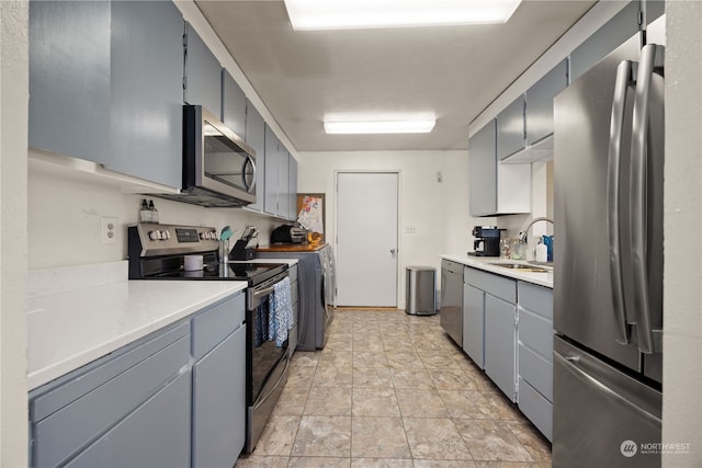 kitchen with stainless steel appliances and sink