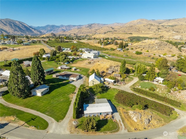 drone / aerial view featuring a mountain view