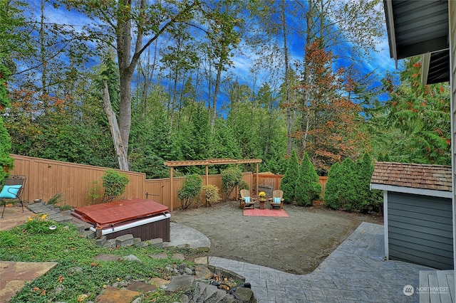 view of patio / terrace featuring a jacuzzi