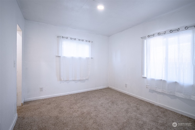 view of carpeted spare room