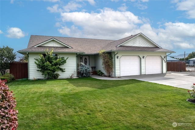 single story home featuring a garage and a front yard