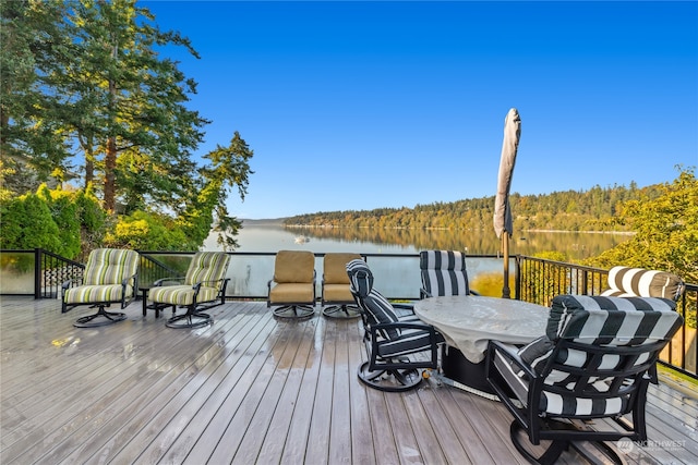 wooden terrace with a water view