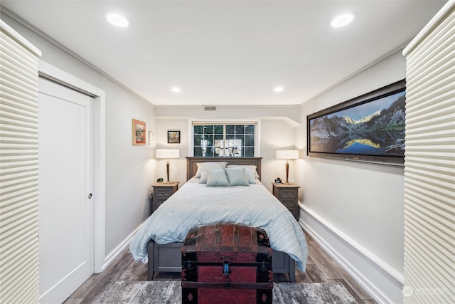 bedroom featuring dark hardwood / wood-style floors