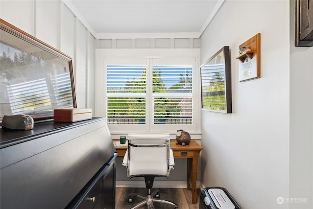 home office with hardwood / wood-style floors