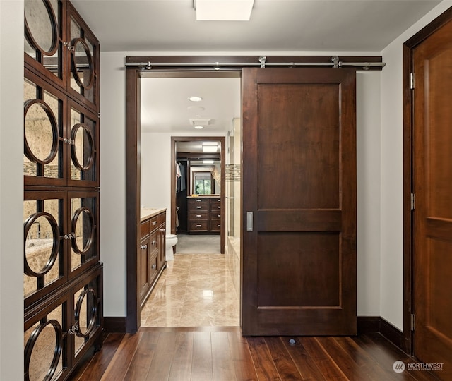 hall with dark hardwood / wood-style floors