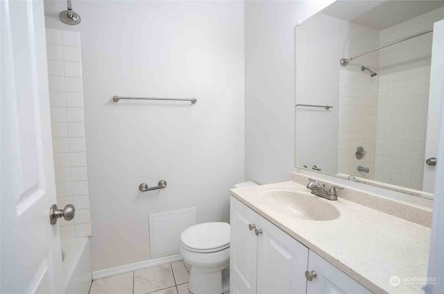 full bathroom featuring vanity, toilet, tile patterned floors, and tiled shower / bath combo