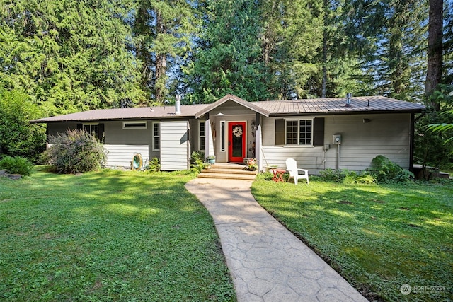 single story home with a front yard