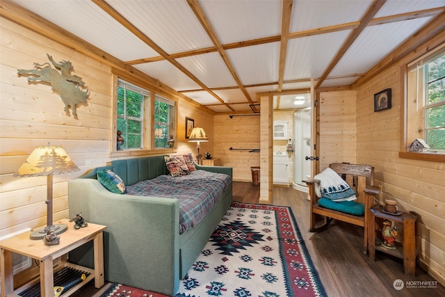 interior space with dark wood-type flooring and wood walls