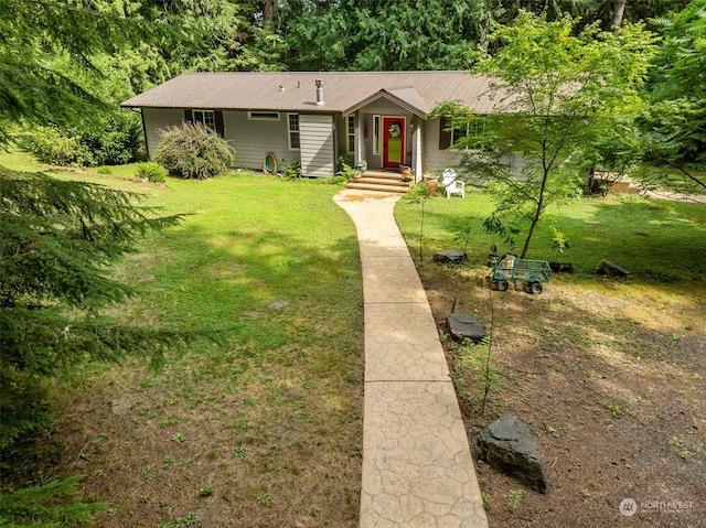 ranch-style house featuring a front yard