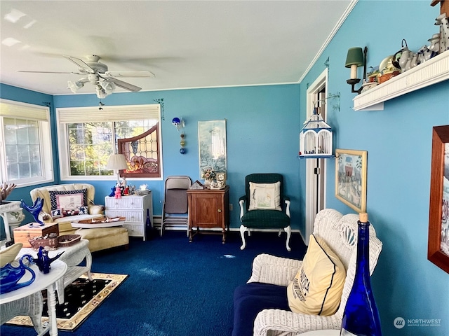 living area with dark carpet, crown molding, and ceiling fan