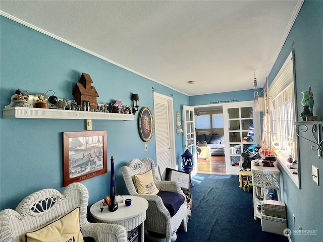 living area with french doors, carpet flooring, a wealth of natural light, and ornamental molding