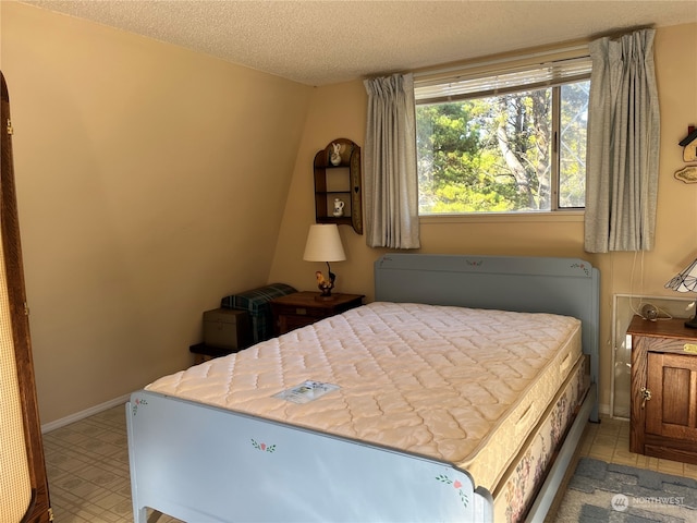 bedroom with a textured ceiling