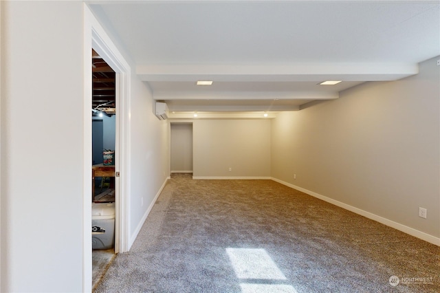 basement featuring carpet floors and a wall mounted AC