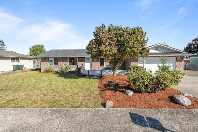 ranch-style house with a garage and a front lawn