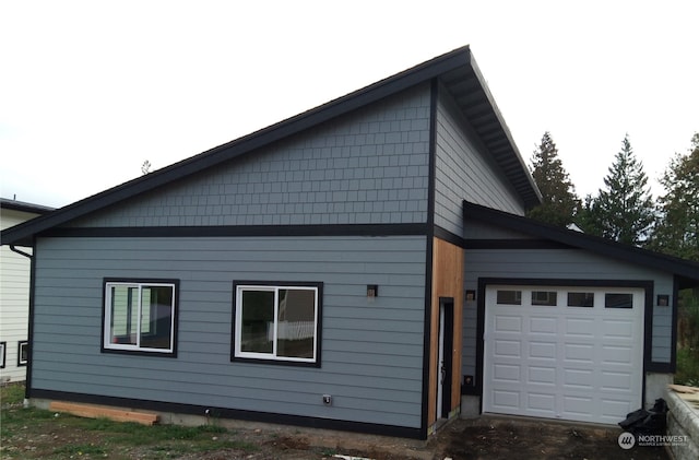 view of home's exterior featuring a garage