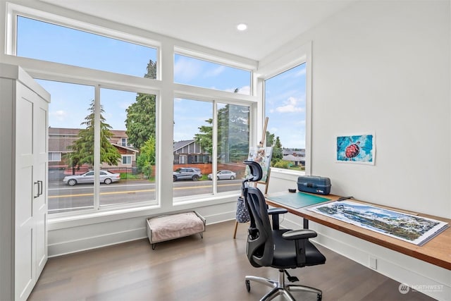 office space with wood finished floors, baseboards, and recessed lighting