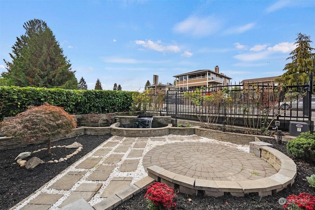 view of patio featuring fence