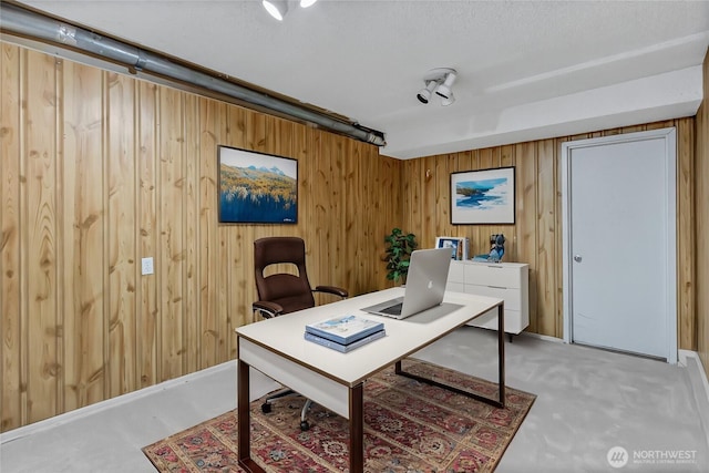 office featuring wood walls