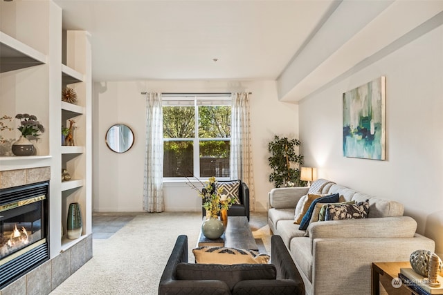 carpeted living room with built in shelves and a fireplace