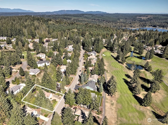 aerial view with a water and mountain view