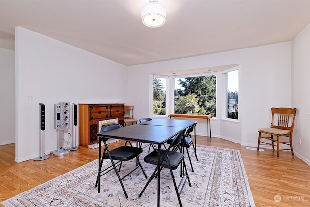 dining room featuring light hardwood / wood-style flooring