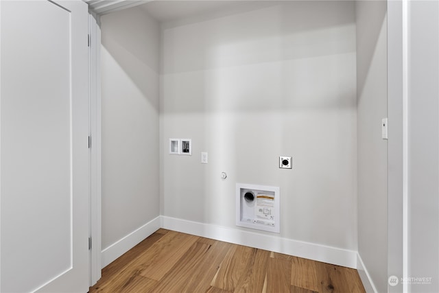 laundry area featuring wood-type flooring, gas dryer hookup, hookup for a washing machine, and electric dryer hookup