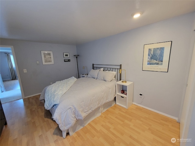 bedroom featuring light hardwood / wood-style floors