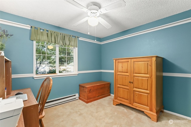 office with light colored carpet, baseboard heating, a textured ceiling, and ceiling fan