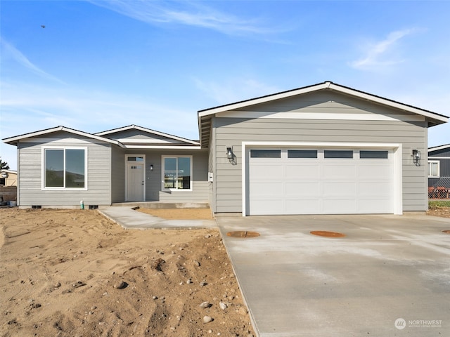 ranch-style house with a garage