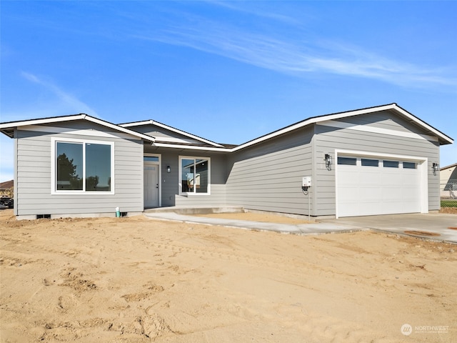 single story home featuring a garage