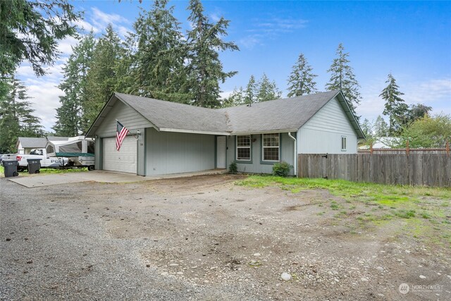 view of front of home with a garage