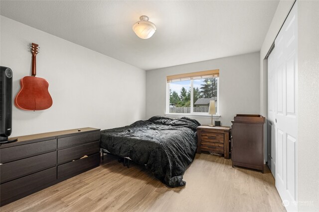 bedroom featuring light wood-type flooring