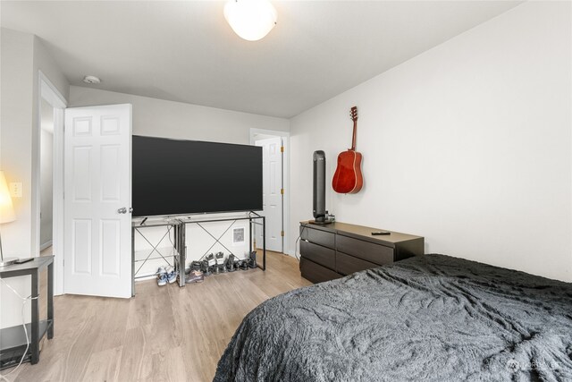 bedroom featuring light wood-type flooring