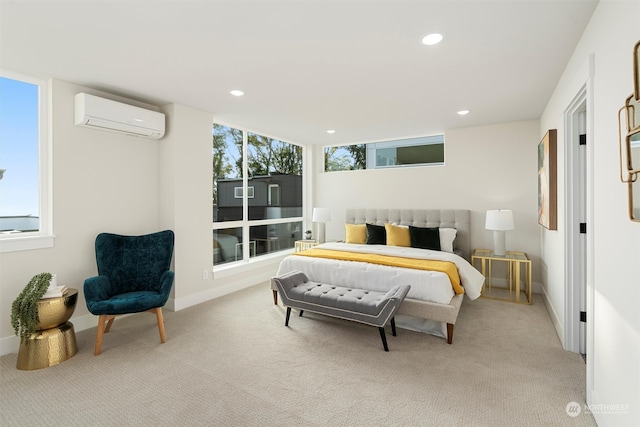 bedroom featuring an AC wall unit, light carpet, and multiple windows