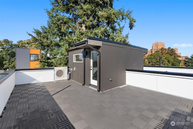 view of patio / terrace featuring ac unit