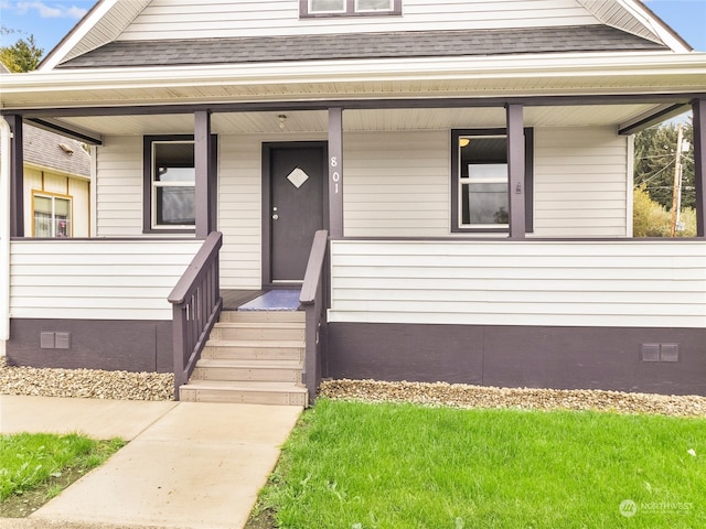 view of front of property featuring covered porch