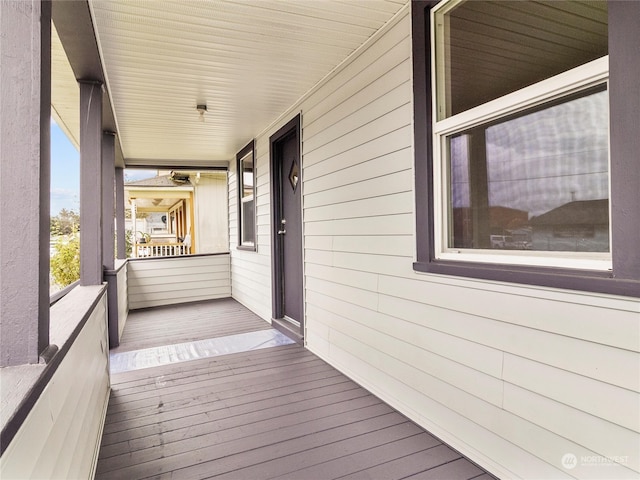 wooden deck featuring covered porch