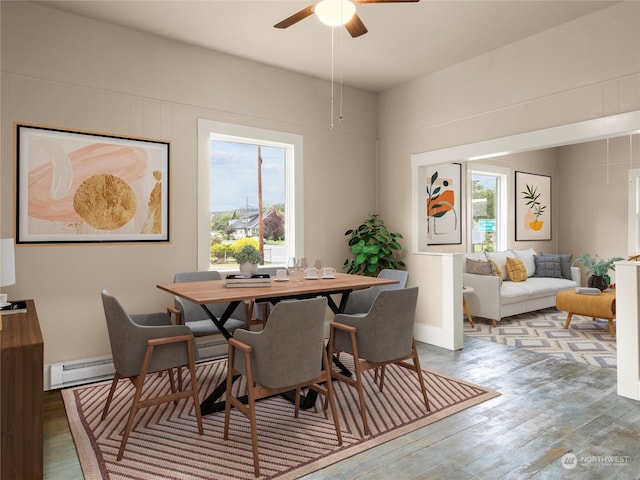 dining space featuring ceiling fan, light wood-type flooring, and a healthy amount of sunlight